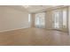 Bright and airy living room with wood floors, recessed lighting, and neutral paint at 9853 Russian Hill St, Las Vegas, NV 89141