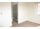 Bedroom with carpet and doorway to bathroom with shower at 1081 Pluto St, Pahrump, NV 89048