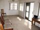 Spacious bonus room with neutral carpet, natural light, and space for seating, a table and other furniture at 1081 Pluto St, Pahrump, NV 89048