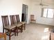 Bonus room area featuring neutral colored carpet and seating for four along a side wall at 1081 Pluto St, Pahrump, NV 89048