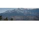 Scenic view of snow-capped mountains creates a stunning backdrop for this listing at 1081 Pluto St, Pahrump, NV 89048