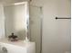 Shower features sliding glass doors at 1081 Pluto St, Pahrump, NV 89048