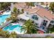 Stunning home featuring a private backyard oasis with a sparkling pool and spa surrounded by lush landscaping at 1600 Windsford Cir, Las Vegas, NV 89117