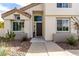 Inviting front entrance featuring desert landscaping and a modern aesthetic at 1600 Windsford Cir, Las Vegas, NV 89117