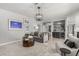 Open concept living area with bar, modern decor, and stylish furniture at 1600 Windsford Cir, Las Vegas, NV 89117