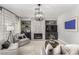 Stylish living area with fireplace and built-in shelves for storing books and decorations at 1600 Windsford Cir, Las Vegas, NV 89117