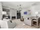 Cozy living room with fireplace, built-in shelves, and comfortable seating area at 1600 Windsford Cir, Las Vegas, NV 89117