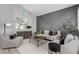 Bright and airy living room with vaulted ceilings, modern decor and wood floors at 1600 Windsford Cir, Las Vegas, NV 89117