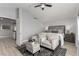 Spacious main bedroom with vaulted ceilings, sitting area, and ensuite access at 1600 Windsford Cir, Las Vegas, NV 89117