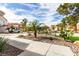 Picturesque street view showcasing desert landscaping and well-maintained homes at 1600 Windsford Cir, Las Vegas, NV 89117