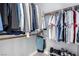 Well-organized walk-in closet with double hanging rods and ample storage space at 1600 Windsford Cir, Las Vegas, NV 89117