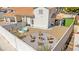 Aerial view highlighting a home with a terracotta roof, a backyard with a firepit and stock tank pool, and meticulous landscaping at 2021 Summit Pointe Dr, Las Vegas, NV 89117