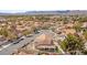 Neighborhood aerial view showcasing well-maintained homes with beautiful landscaping and mountain views at 2021 Summit Pointe Dr, Las Vegas, NV 89117