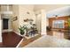 A living room area features a desk, decor, and an open concept at 2021 Summit Pointe Dr, Las Vegas, NV 89117