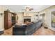 Cozy living room with a fireplace, entertainment center, and comfortable sectional sofa at 2021 Summit Pointe Dr, Las Vegas, NV 89117