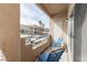 Private balcony with seating, perfect for relaxing and enjoying views of the surrounding community at 2160 Highpointe Dr # 103, Laughlin, NV 89029