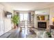 Living area featuring a fireplace, modern furniture, and lots of natural light at 2160 Highpointe Dr # 103, Laughlin, NV 89029