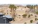 Condo exterior with desert landscaping, tile roof, and covered parking in a gated community at 2160 Highpointe Dr # 103, Laughlin, NV 89029