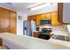 Spacious kitchen with stainless steel appliances, lots of cabinets, and a functional breakfast bar at 2160 Highpointe Dr # 103, Laughlin, NV 89029