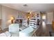 Open-concept living room with modern furnishings, a ceiling fan, and lots of natural light at 2160 Highpointe Dr # 103, Laughlin, NV 89029
