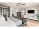Spacious main bedroom with a lounge, flat screen tv, and plenty of storage space at 258 Castellari Dr, Las Vegas, NV 89138