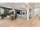 Open concept living and dining area with seamless flow, stylish furnishings, and abundant natural light at 258 Castellari Dr, Las Vegas, NV 89138