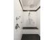 Modern walk-in shower with built-in bench and rainfall shower head at 258 Castellari Dr, Las Vegas, NV 89138
