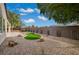 Backyard featuring low maintenance zen-style landscaping with some modern touches at 2603 Savannah Springs Ave, Henderson, NV 89052