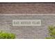 Black Mountain Village sign is displayed on the exterior wall of the community at 2603 Savannah Springs Ave, Henderson, NV 89052