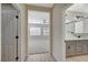 Hallway with open view of bedroom and bathroom at 2603 Savannah Springs Ave, Henderson, NV 89052