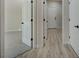 Hallway with wood floors and lots of storage at 2603 Savannah Springs Ave, Henderson, NV 89052