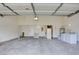 Spacious garage featuring laundry, storage, and ample parking space at 2716 Ferrin Rd, Las Vegas, NV 89117