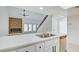 Open concept with a kitchen island connecting the kitchen to the living room at 2716 Ferrin Rd, Las Vegas, NV 89117