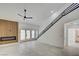Spacious living room with a fireplace and natural light from French doors at 2716 Ferrin Rd, Las Vegas, NV 89117