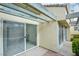 Private patio featuring sliding glass doors, and textured stucco at 2716 Ferrin Rd, Las Vegas, NV 89117