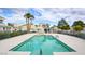 Community pool featuring blue tile and ample lounge space at 2716 Ferrin Rd, Las Vegas, NV 89117