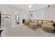 Comfortable living room with neutral colors and ample seating at 3065 Lenoir St, Las Vegas, NV 89135