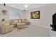 Cozy living room with plush seating and natural light at 3065 Lenoir St, Las Vegas, NV 89135