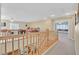 Spacious loft with staircase view, recreational area, and access to additional living spaces at 3065 Lenoir St, Las Vegas, NV 89135