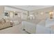 Bright main bedroom featuring a comfortable sitting area and ensuite bathroom access at 3065 Lenoir St, Las Vegas, NV 89135