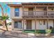 Inviting townhouse showcasing a private balcony, neutral paint, and low-upkeep desert landscape at 3141 Pinehurst Dr # C, Las Vegas, NV 89109