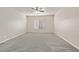 Large bedroom with neutral walls and carpeting and window for great natural light at 33 Gentilly Lace Ave, Henderson, NV 89002