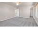 Spacious bedroom featuring plush carpeting and a charming, colorful ceiling fan at 33 Gentilly Lace Ave, Henderson, NV 89002