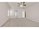 Spacious bedroom featuring neutral paint, carpeted floors, and ceiling fan for comfortable living at 33 Gentilly Lace Ave, Henderson, NV 89002