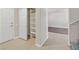 Inviting entryway with tiled floor, closet, and staircase access to upper level at 33 Gentilly Lace Ave, Henderson, NV 89002