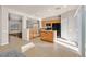 Bright kitchen features light wood cabinets, black appliances, and an island, perfect for Gathering gatherings at 33 Gentilly Lace Ave, Henderson, NV 89002