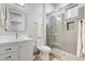 Modern bathroom featuring a glass-enclosed shower, stylish vanity, and contemporary fixtures at 33 Hassayampa Trl, Henderson, NV 89052
