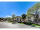 Beautiful single-story home with a well-manicured yard and mature trees providing shade at 33 Hassayampa Trl, Henderson, NV 89052