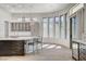Bright, modern kitchen with marble countertops, stainless steel appliances, and sleek wooden cabinetry at 33 Hassayampa Trl, Henderson, NV 89052