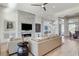 Inviting living room with stone fireplace, modern decor, and comfortable seating arrangement at 33 Hassayampa Trl, Henderson, NV 89052